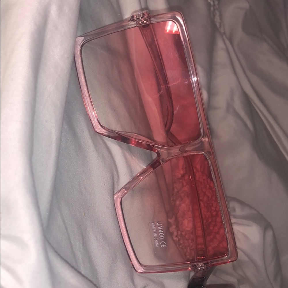 black and pink pair of shades.